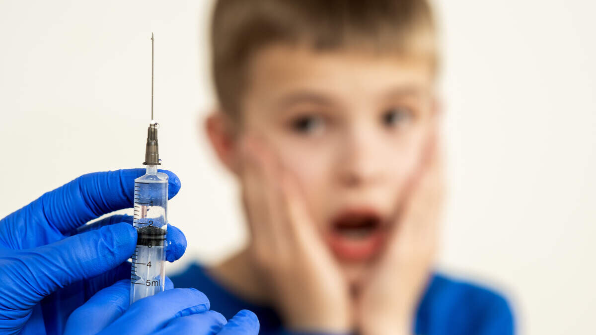 Coronavirus vaccine - boy fearing needle - Fruit-Powered